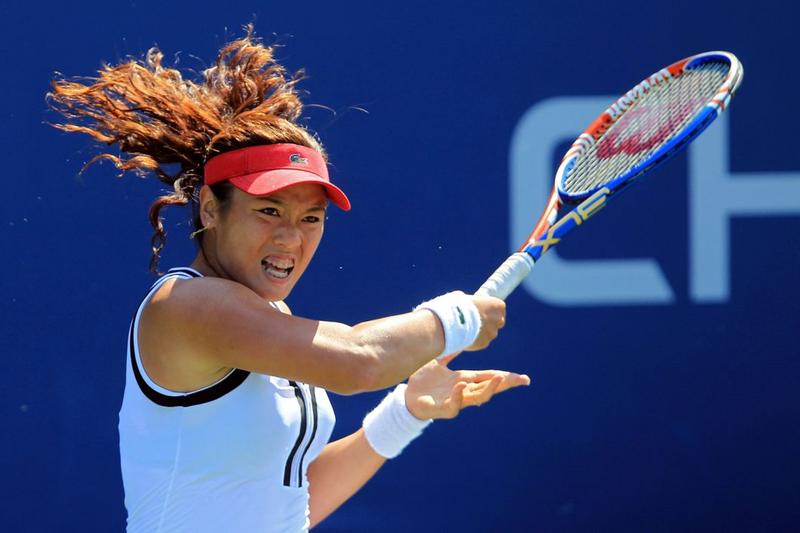 NEW YORK - AUGUST 31: Yung-Jan Chan of Chinese Taipei returns a shot against Anne Keothavong of Great Britain during her women's singles first round match on day two of the 2010 U.S. Open.